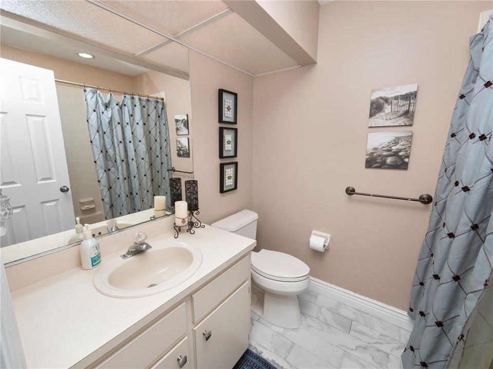 Guest bathroom with tub/shower combo