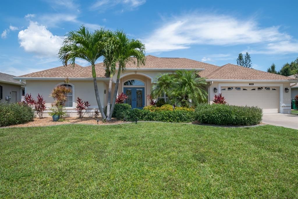 Beautiful curb-appeal on one of the prettiest streets in Rotonda West.