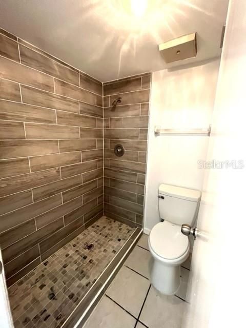 Master bath has step in shower