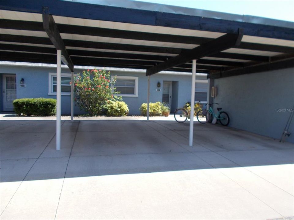 The reserved and covered carport. The spot is the second space from the right.