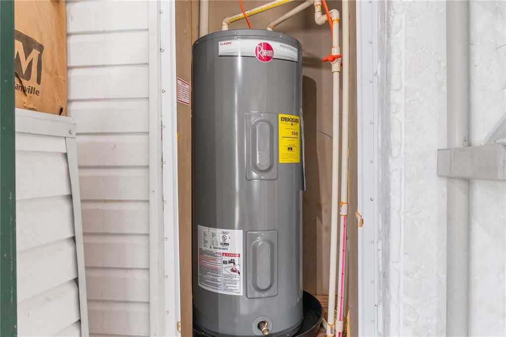 New water heater. Located in large storage area.