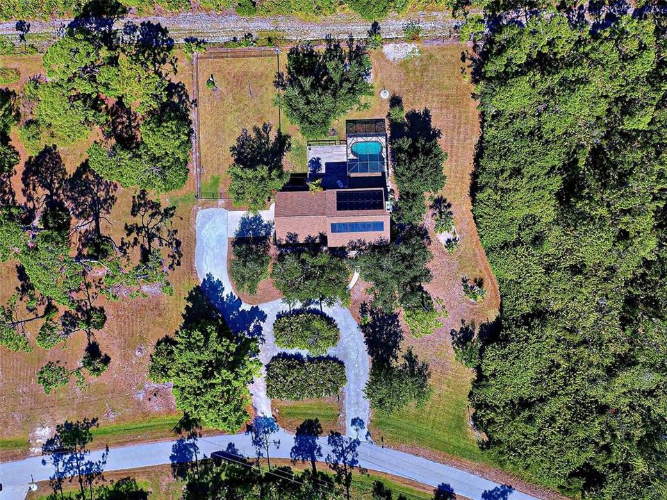 CIRCULAR DRIVEWAY WITH PLENTY OF PARKING.