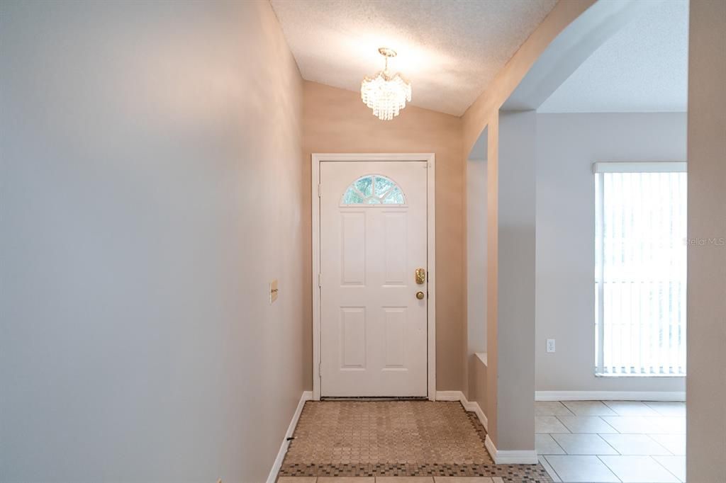 Entry way leads to formal living/dining room