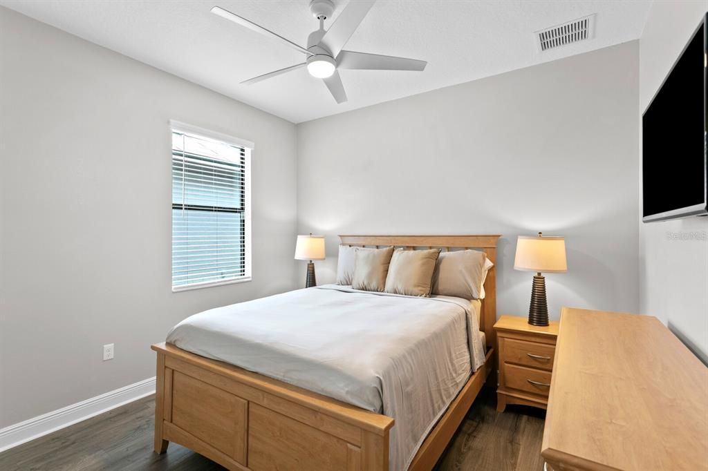 The 3rd bedroom has great natural light and a ceiling fan