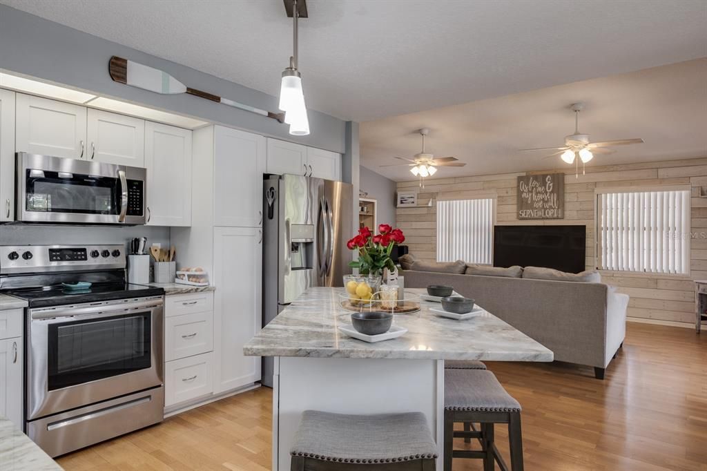 kitchen with granite counter tops and island