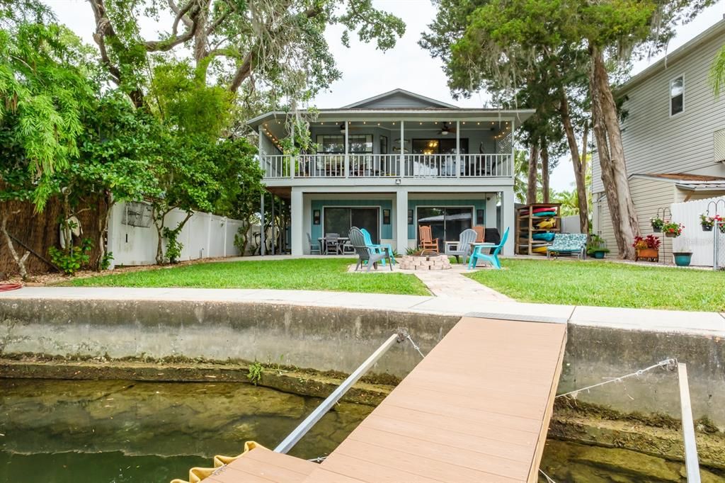 view of backyard/house from floating dock