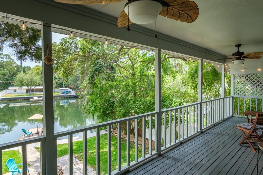 top level covered porch with view