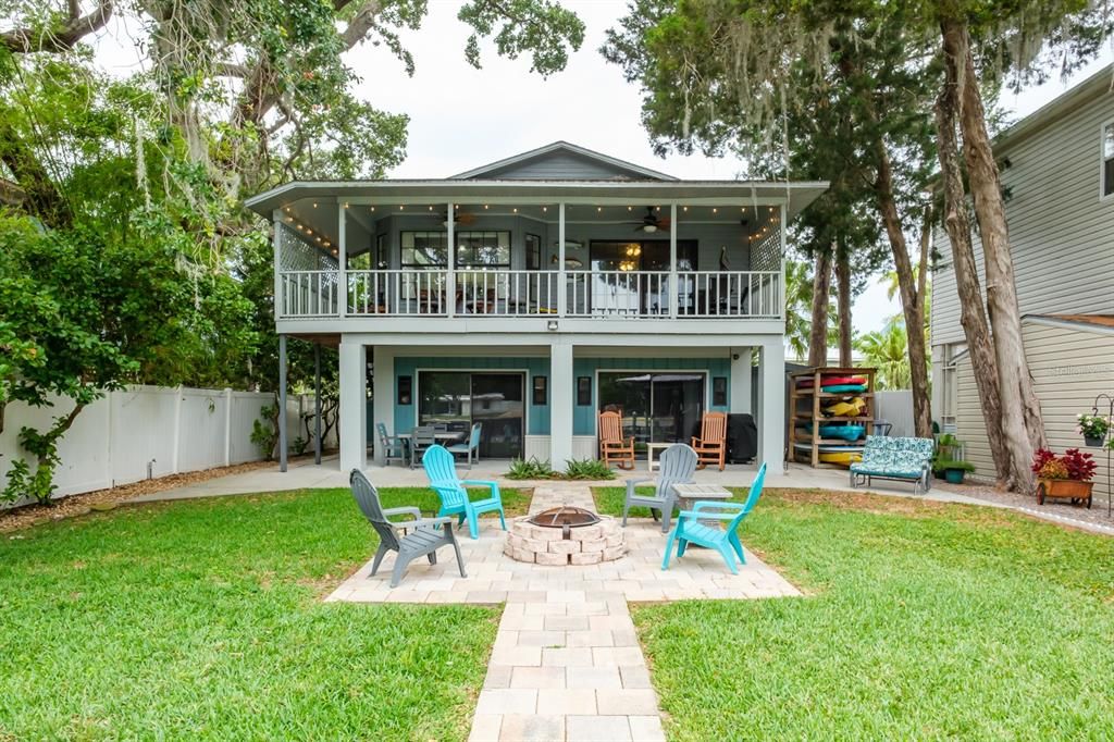 view of backyard/house from floating dock