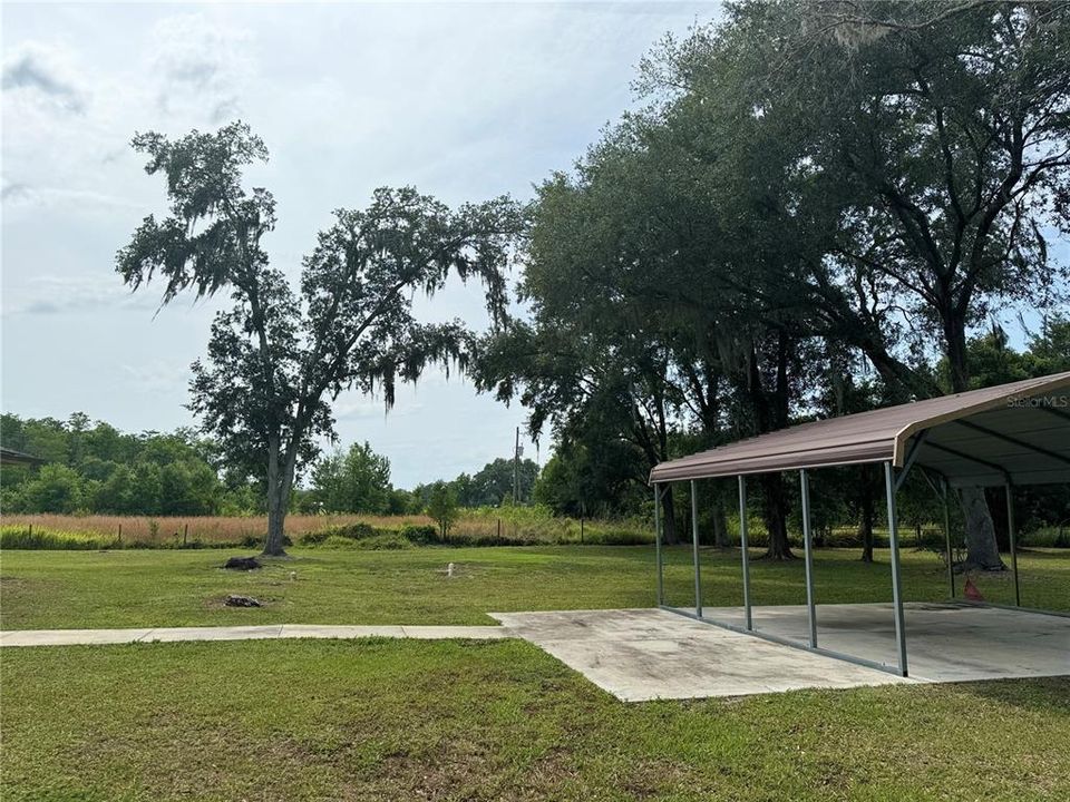 Front yard with carport