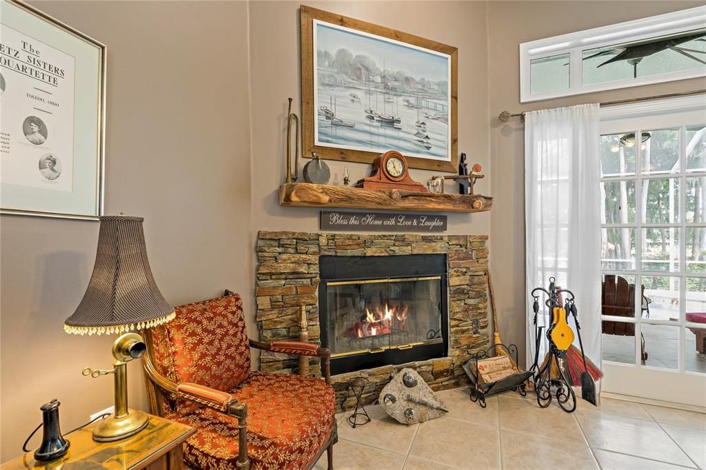 Family room with wood burning fireplace