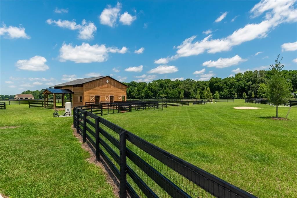 3-stall horse barn from the back-side yard