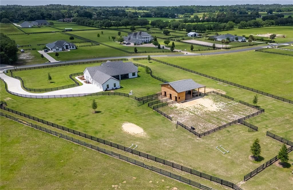 Arial view of the property and surrounding area