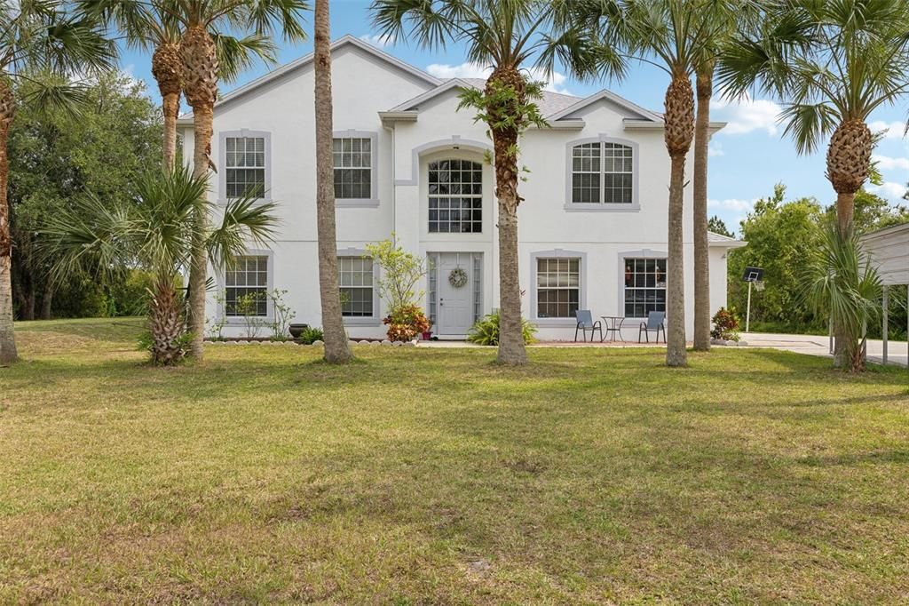 There are eight windows just on the front of the home letting natural light highlight everything there is so love about this flowing floor plan.