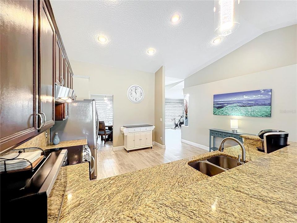 Huge Kitchen Area with Granite counters and back splash.