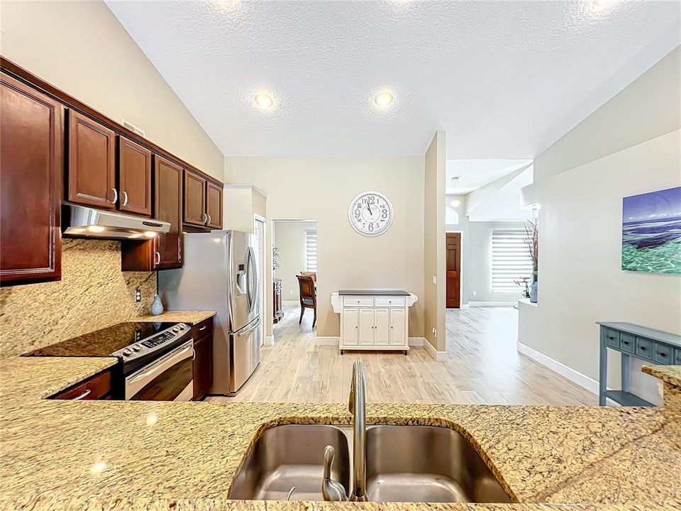 Huge Kitchen Area with Granite counters and back splash.