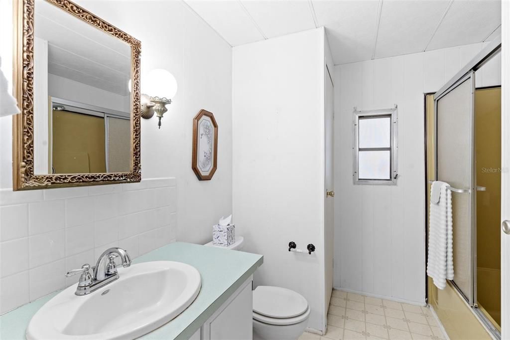 Guest Bathroom with Tub and Shower Combo