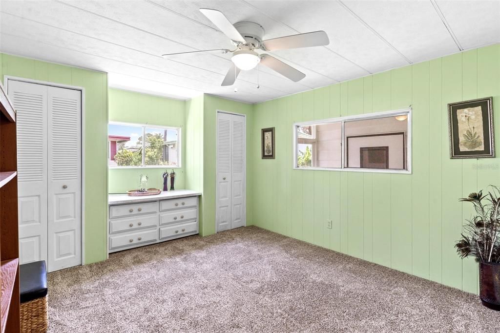 Bedroom Two with Built-in Dresser and Two Wall Closets