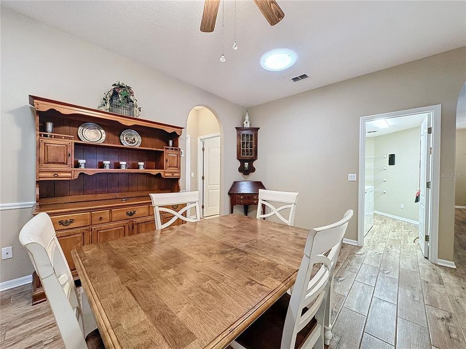 Entry into laundry room from dining room area