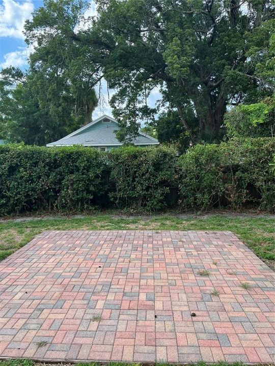 Patio in middle of backyard