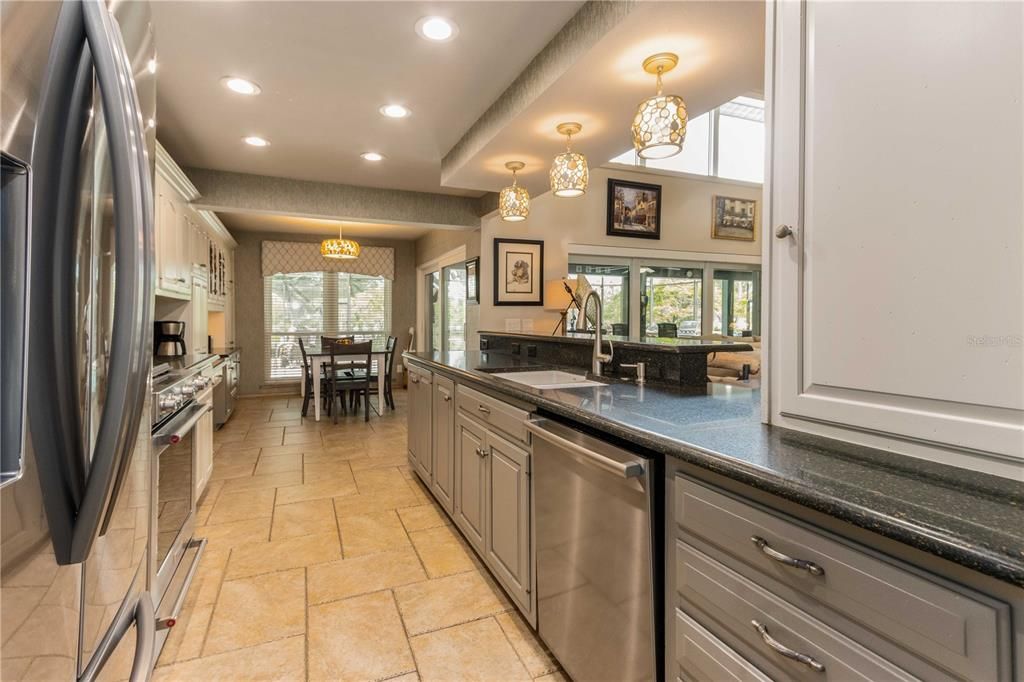 Kitchen with stainless appliances and granite counter