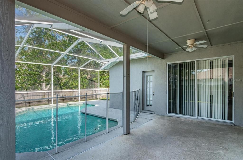 Screened porch and pool. Child safety fence in place.