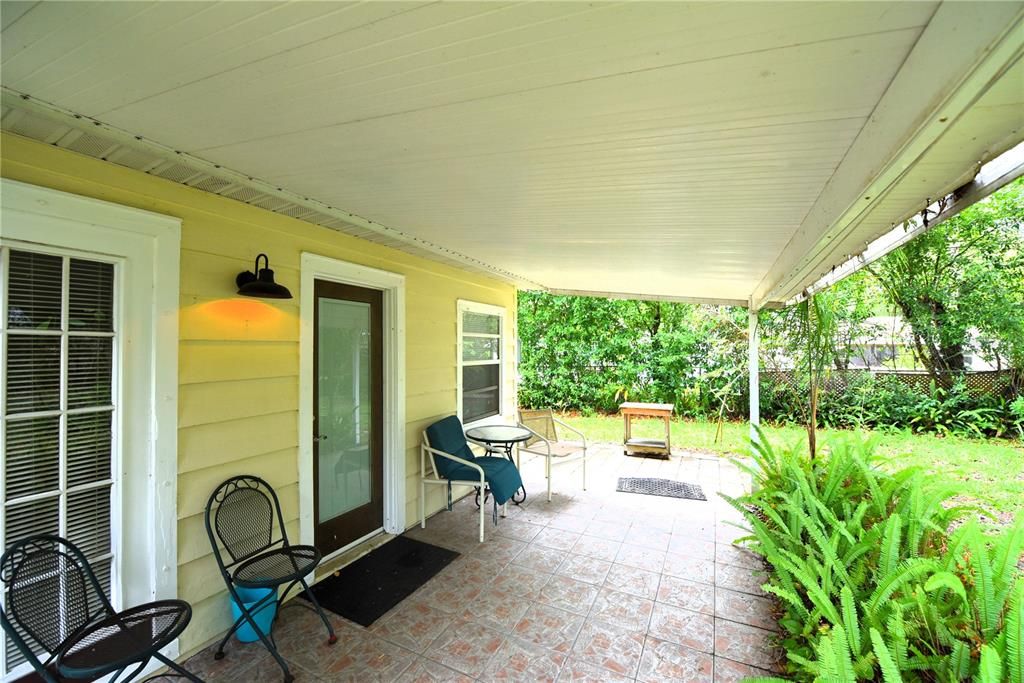 Second House private entry door and covered porch.