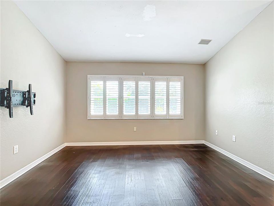 Living Room with plantation shutters with granite windowsills.