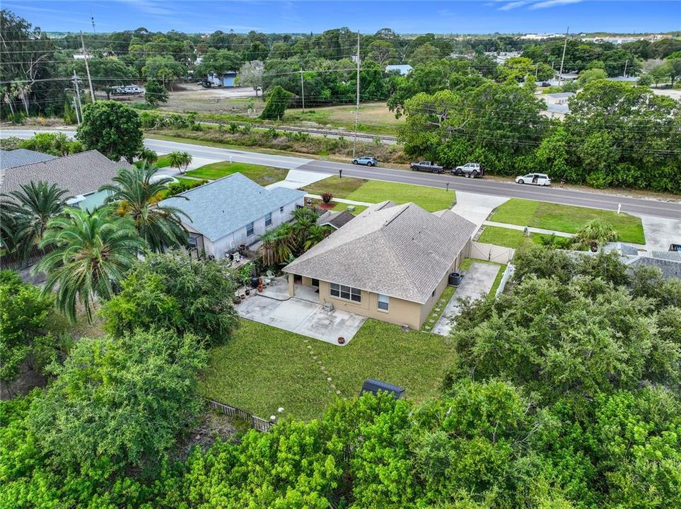 Situated without rear neighbors, the property boasts an oversized lot that will delight nature lovers.