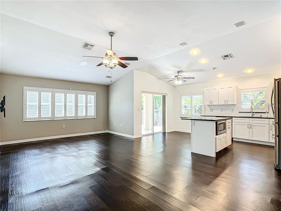 From the kitchen, you have an open floor plan looking into the living room.