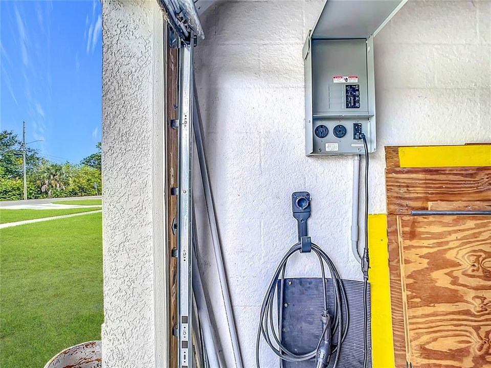 Electric car charging station that supports Level 1, 2, and 3 charging.