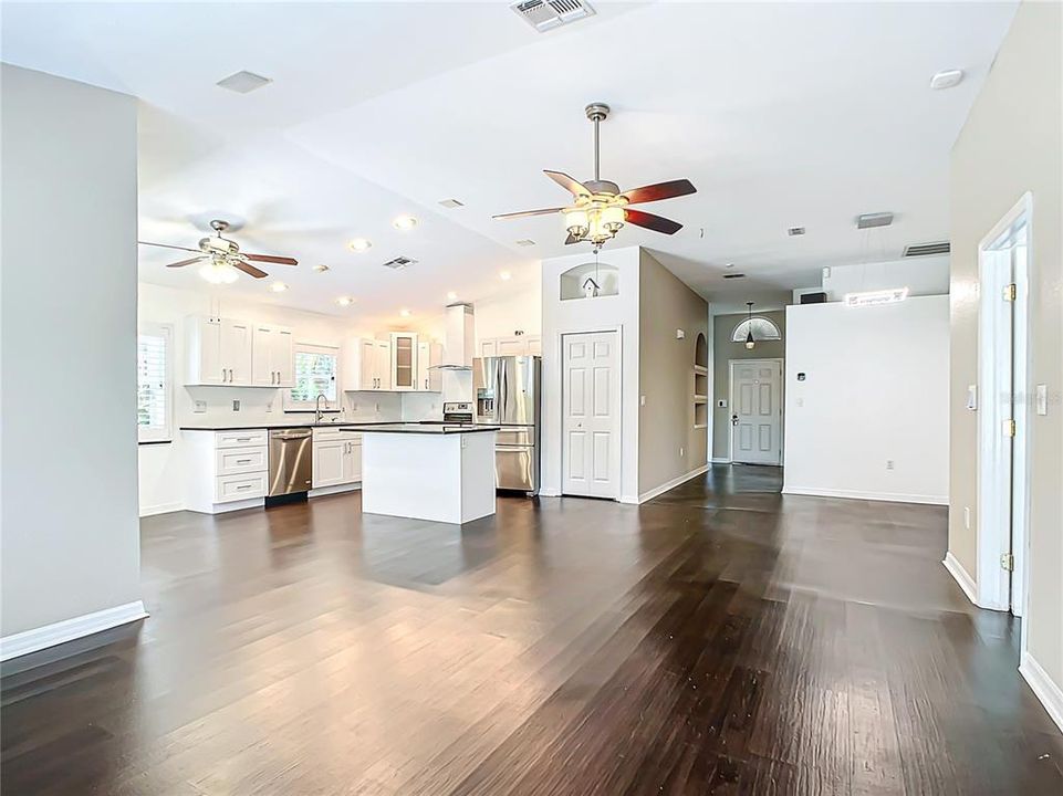 Open floor plan connects the living room to the kitchen and dining area, perfect for gatherings.