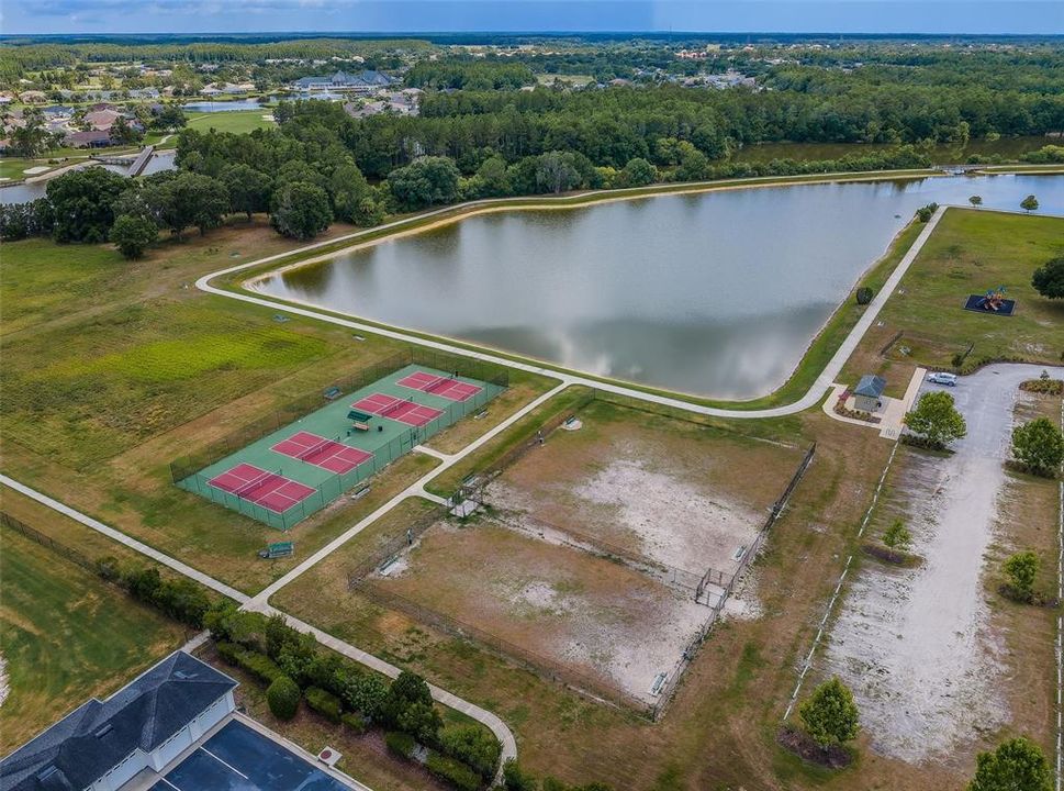 Aerial of Trinity Communities Park - Walking path around a Lake