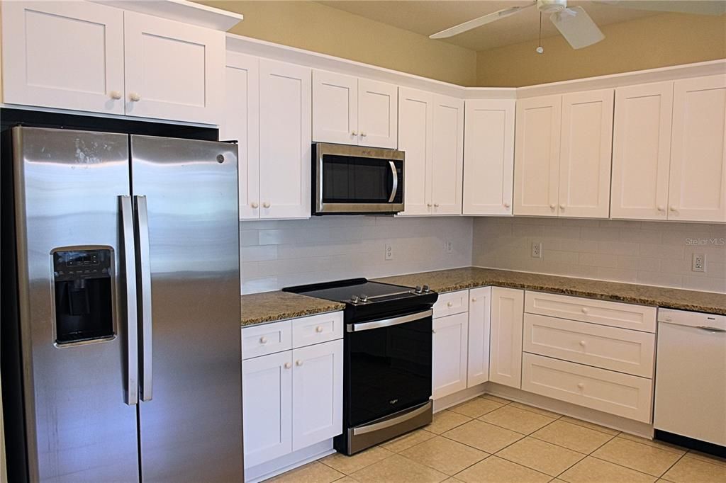 Kitchen with new cabinets, granite counters, and new appliances