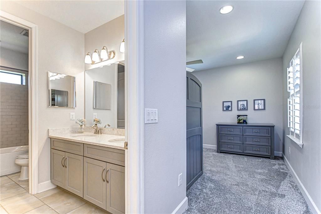 2nd Bathroom with dual vanity.