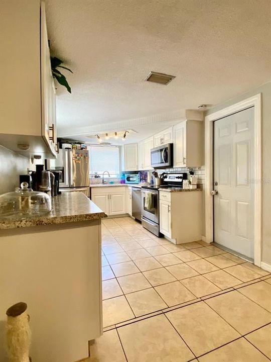 From Dining room into kitchen