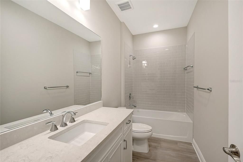 Guest Bath w/ceramic tile and quartz countertops