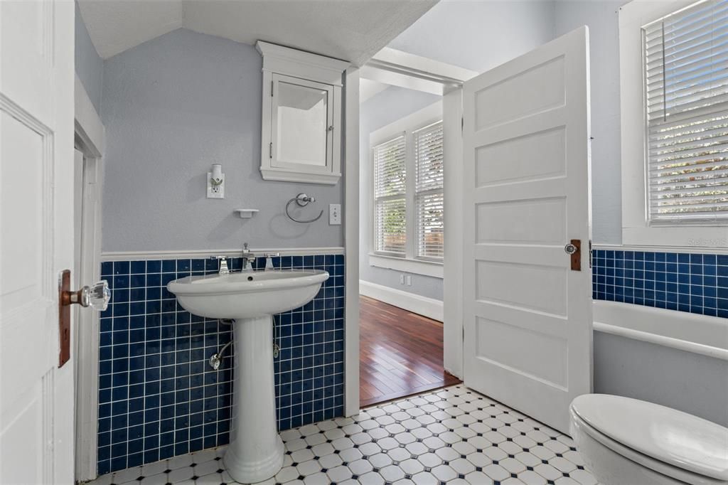 Jack-and-Jill bathroom with clawfoot tub