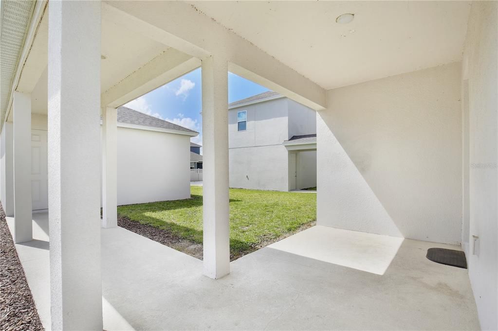 Porch to the 2 Car Garage