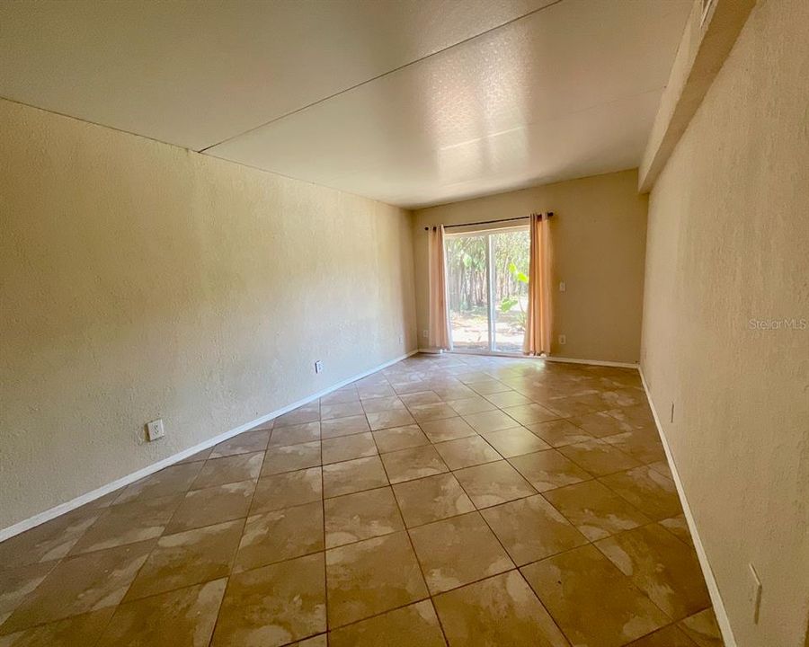 Family room with slider to backyard.