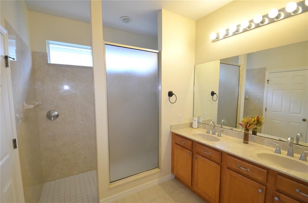 Large walk-in shower that is level for handicap access if needed.