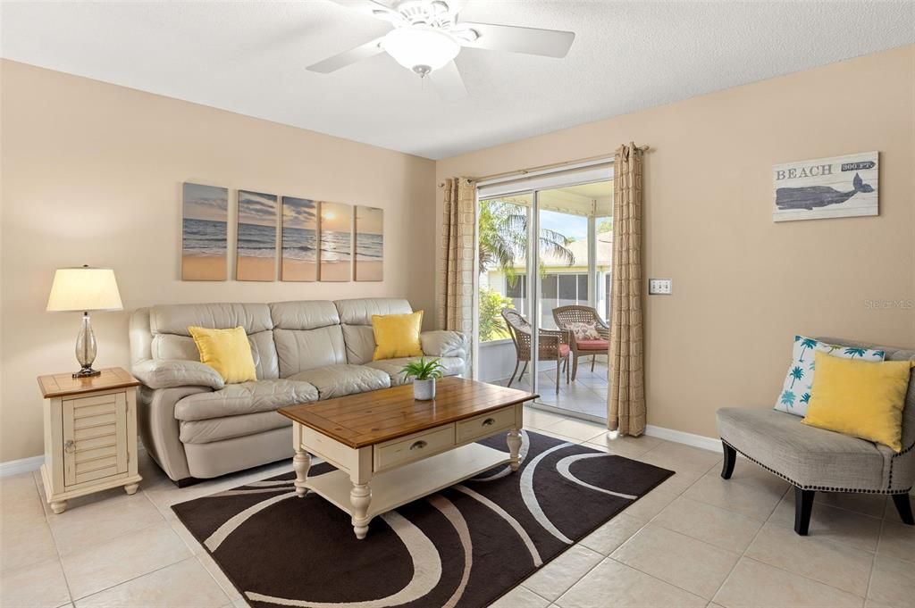 Sliding Glass Doors lead to the Screened in Lanai