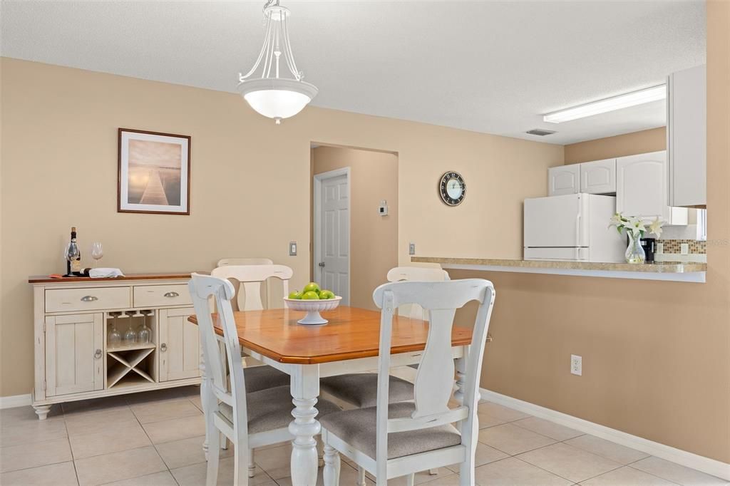 Nice Dining Room with Breakfast Bar leading to the Kitchen