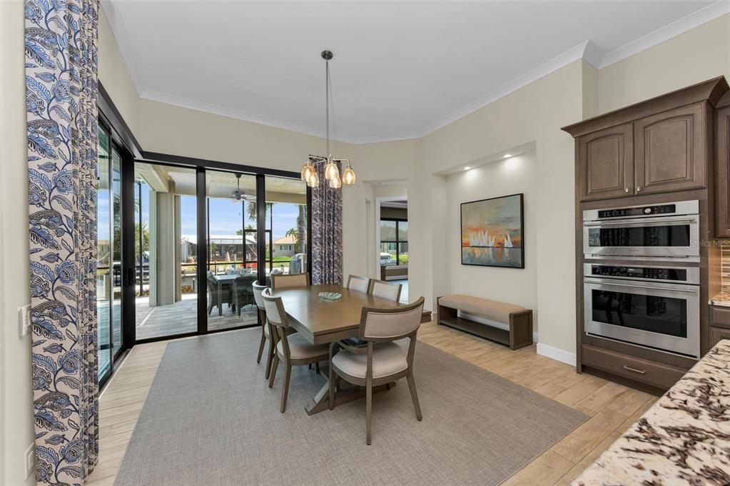 Large Dining Room with corner sliding glass doors