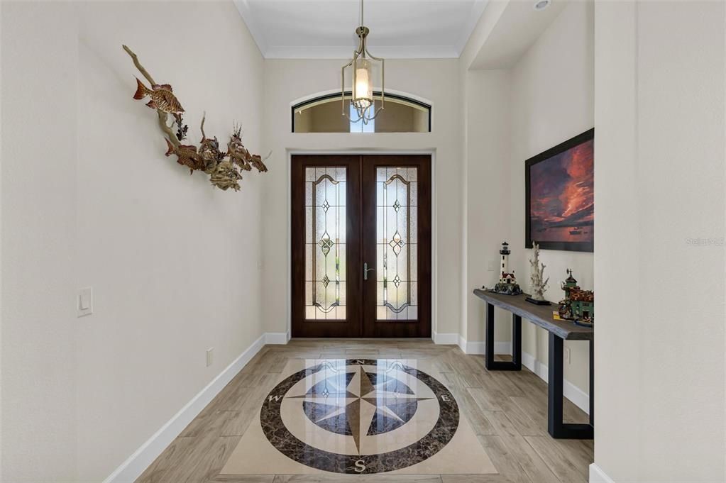 Foyer with inlay marble nautical star, pointing due north