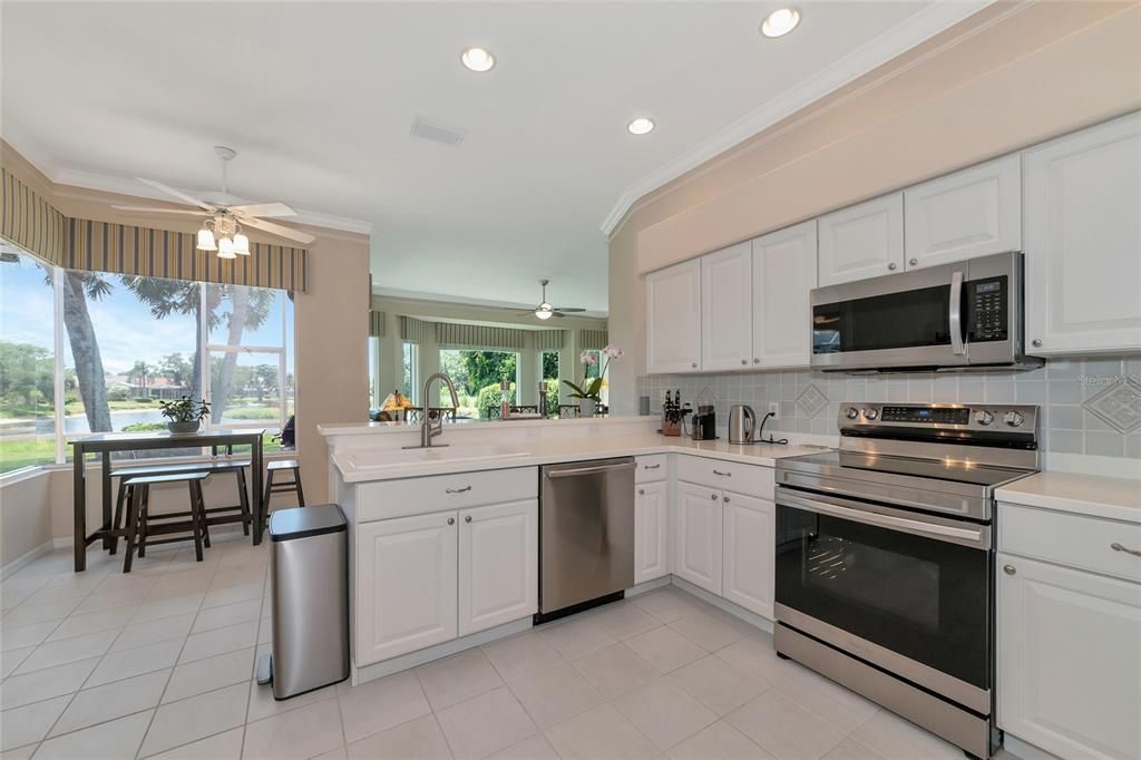 Show kitchen open to café, large family room & lake view.