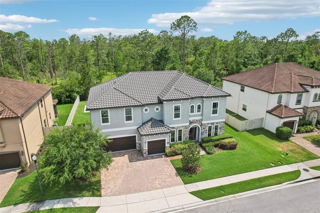 With NO REAR NEIGHBORS and LOCATED at the start of a CUL-DE-SAC, the SIZE and LAYOUT make this an ENTERTAINER’S DREAM HOME, but at the same time, maintains a VERY TRANQUIL and PRIVATE, WARM HOME FEELING! This EXTREMELY DESIRABLE OVIEDO COMMUNITY is made up of 26 OVERSIZED HOMESITES featuring Homes ranging from 3,114 sqft to 5,111 sqft and is PERFECTLY LOCATED close to and ZONED FOR TOP RATED OVIEDO SCHOOLS: HAGERTY HIGH SCHOOL, JACKSON HEIGHTS MIDDLE SCHOOL and CARILLON ELEMENTARY!