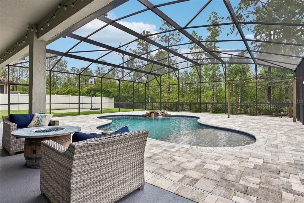 The CUSTOM, HEATED SALTWATER POOL was DESIGNED and INSTALLED in LATE 2018 and BOASTS approximately 2,000 SQUARE FEET of JUST POOL, POOL DECK and COVERED LANAI SPACE!