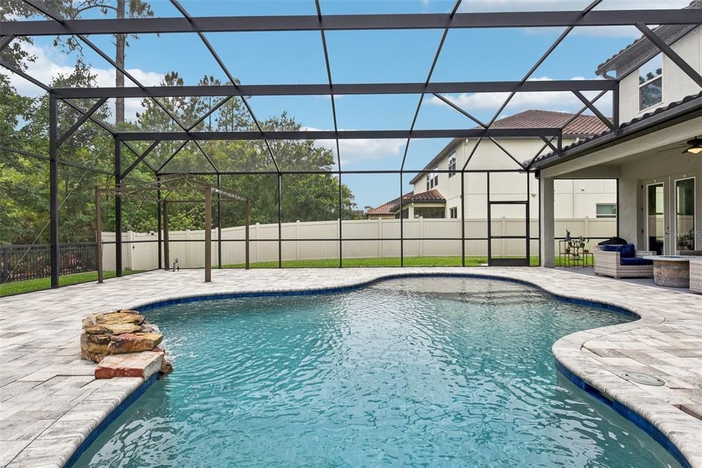 The CUSTOM, HEATED SALTWATER POOL was DESIGNED and INSTALLED in LATE 2018 and BOASTS approximately 2,000 SQUARE FEET of JUST POOL, POOL DECK and COVERED LANAI SPACE!