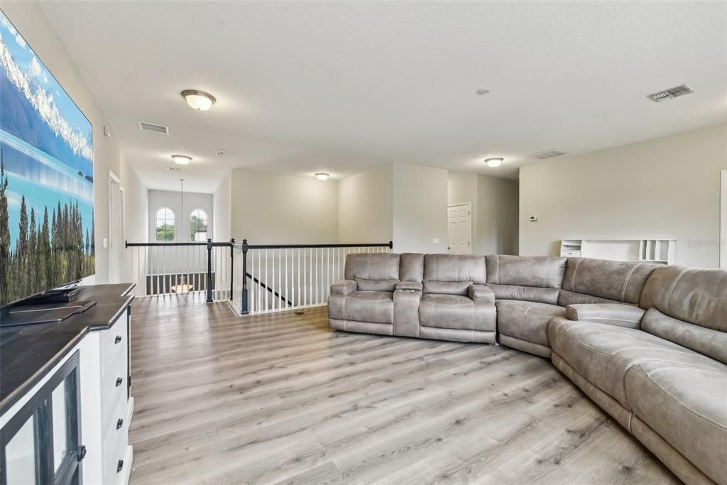 OVERSIZED LOFT that measures over 450 sqft! The LOFT is PERFECT for a GAME ROOM, MOVIE ROOM, BILLIARDS ROOM, a COMBINATION of those things or just a RELAXING SPOT to hangout and recharge!