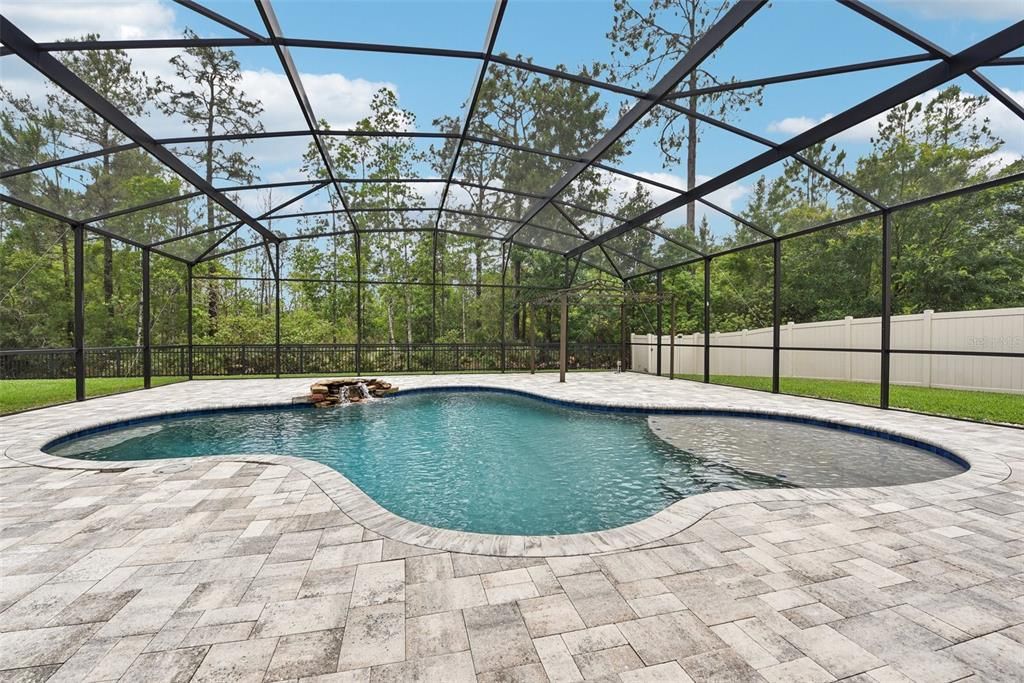 The CUSTOM, HEATED SALTWATER POOL was DESIGNED and INSTALLED in LATE 2018 and BOASTS approximately 2,000 SQUARE FEET of JUST POOL, POOL DECK and COVERED LANAI SPACE!